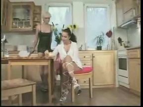 Shemale fucks the girl's ass and cums on her