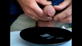 Ejaculating on a plate