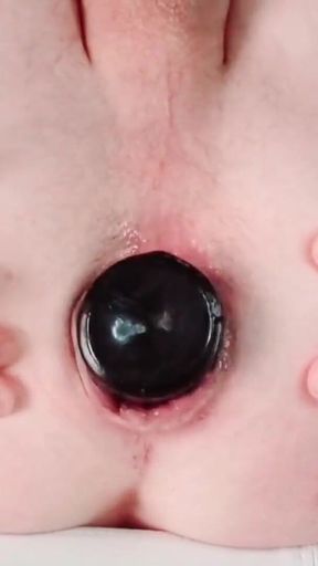 Key moment from &quot;Black dildo fully disappear anal&quot;