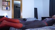 Jonathan in Spiderman costume masturbating his erect uncut cock horny to play