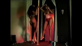 Busty ebony lesbians fuck with sex toys on the stage