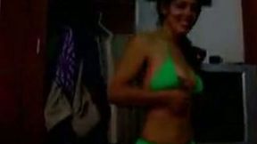 Slim amateur Indian girl is posing for cam wearing tiny bikini