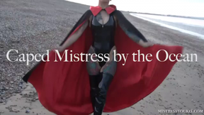 Caped Mistress by the Ocean