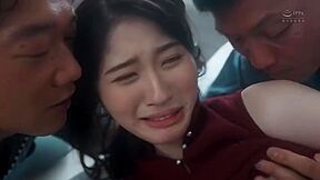 My beloved wife is sandwiched between me and him, like a skewer with no way to escape.