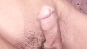 Hung guy tugs his hard unshaved prick until spraying a big load