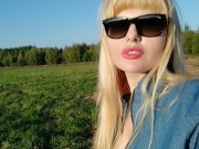 A sunny day & a gorgeous milf sunbathing in the field feeling sexy!