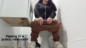 Peeing in a public restroom