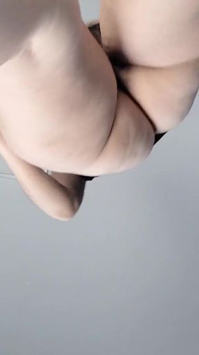 Key moment from &quot;Amateur brunette vibrator massage naked. Latina hairy pussy, big tits, big ass.&quot;