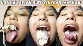 Eating ravioli with chicken and ham