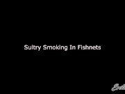 Sultry Smoking Blonde MILF In Fishnets Bra and Panties - Nikki Ashton