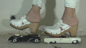 Two collector model cars for Christin floor view