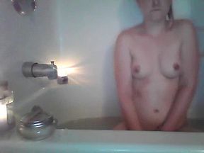 Little Lucky takes a bath, rubs feet, and fucks herself