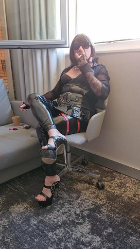 Smoking mature in vinyl outfits