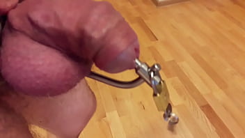 Male urethral chastity with small bullet plug inside first