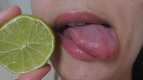 I bite into a lemon and make silly faces then I grimace and a lot of saliva flows from my mouth I put the lemon on my tongue and grimace in 4k