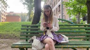 Eva smokes multiples on public bench