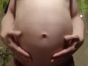 Blowing water from a hose in the shower