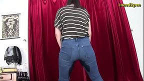 Sinn plays bladder holding game wetting her jeans