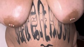 Oiled up M cup tits