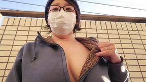 Japanese housewife excitedly masturbates on balcony with glass door