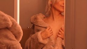 Blonde tries on different outfits and does a blowjob