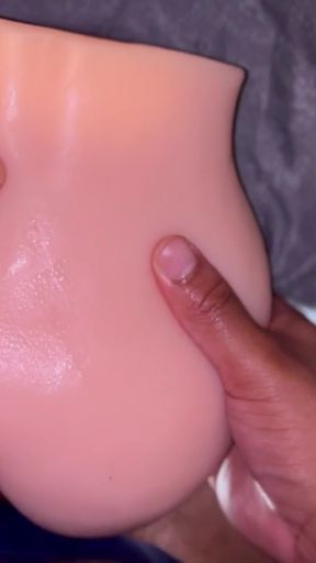 Key moment from "Fucking Sex Doll Leads To Messy Moaning Cumshot"