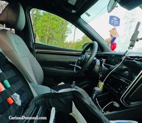 Carissa masturbating while driving to a bondage shoot