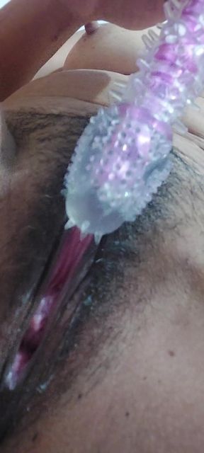 She Got Naked and Masturbated with a Dildo in Her Pussy