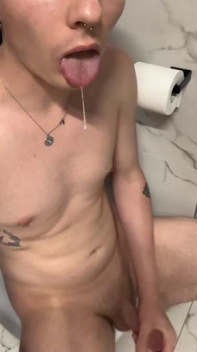 Twink jerks off his small cock in a submissive tattoo pose