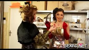 Females share the same jock in superb back yard clothed porn