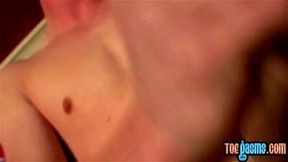 Blond Jordan Ashton touches feet while masturbating