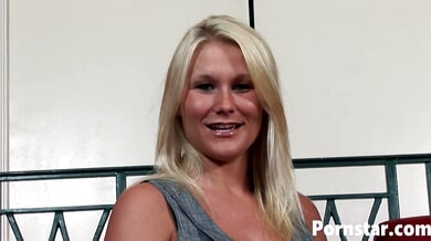 Juliana Jolene teases in gray before going nude on the red couch