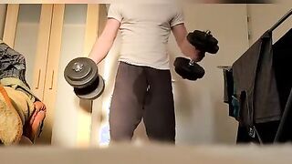 bulky stud doing exercises at home nude
