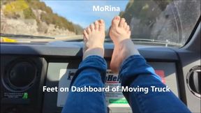 Feet on Dashboard of Moving Truck mobile vers