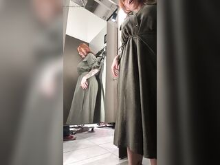 Enjoyable breasty mom changes garments and tries on different outfits whilst touching herself.