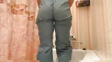 Girl with cool ass pee in jeans, play with shower and play with pussy until she cum