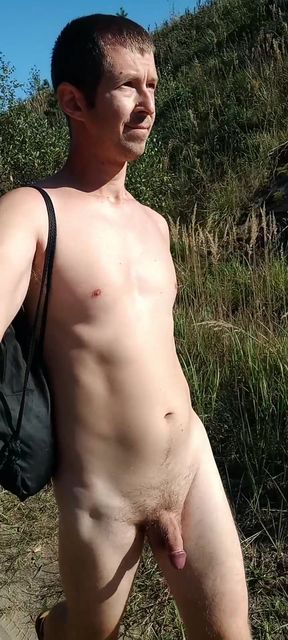 Russian nudist walks completely naked near the highway