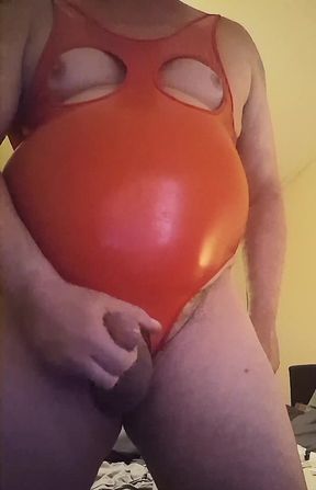 Chubby grandpa wearing crotchless latex bodysuit and wanking his semi and cumming hard