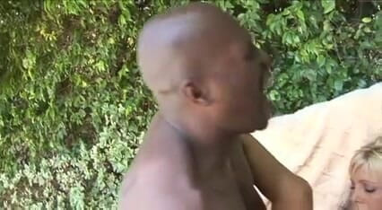 Busty milf copulates with black dude by the pool