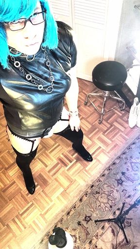 sexy Kandi dancing in tight leather, and heels
