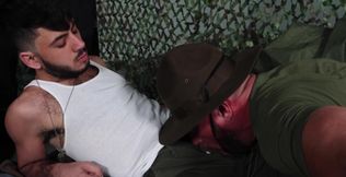 Army action with a bald stud and a petite brunette fella