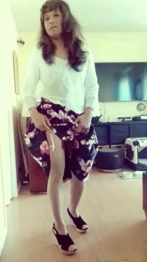 Jhazmeena wearing a white blouse and a vintage black flower print skirt.