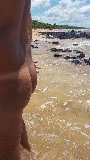 Sissy ladysilva walks naked on the beach with her hot ass tanned and masturbating his cock until she cums