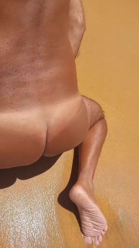 Sissy ladysilva walks naked on the beach with her hot ass tanned and masturbating his cock until she cums