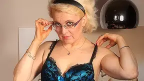 Horny Mature Lady Playing With Her Dildo On The Couch - MatureNL