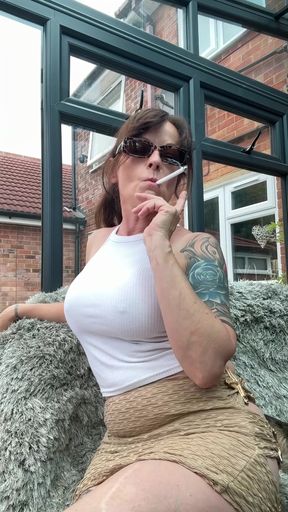 Smoking MILF gets it on with a group