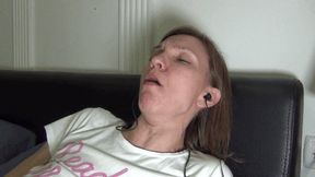 Coughing and searching in the smartphone with headphones (H)