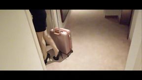 MILF in Stockings and Heels Walks Through the Corridors of a Hotel