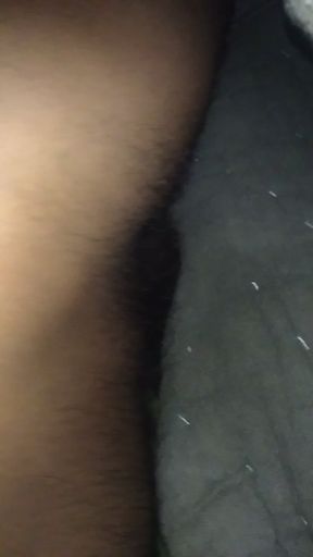 Feed Under a Quilt on the Bed.