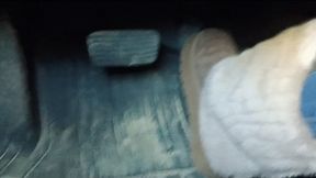 Evalynn driving the loaner in furry winter boots 2